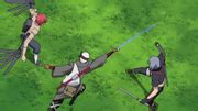 Escena de batalla entre Kankurō y Sasori