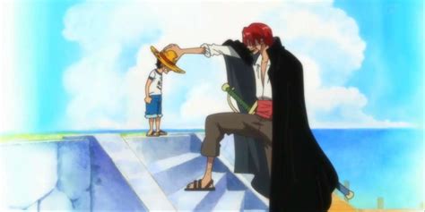 Monkey D. Luffy en su infancia con Shanks