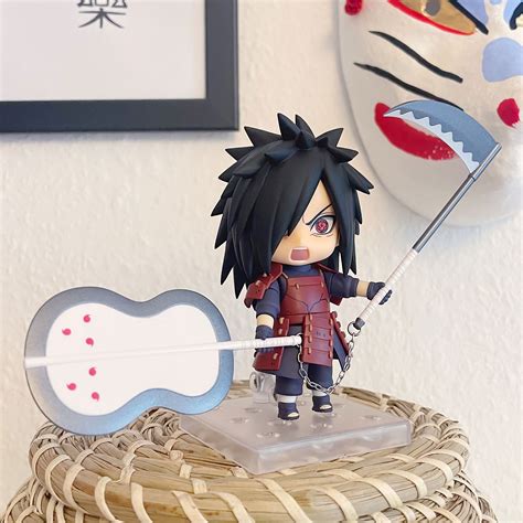 Detalle de los ojos Sharingan de la figura de Madara Uchiha