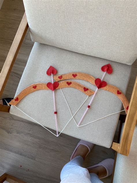 Cupido con arco y flechas