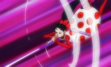 Charlotte Flampe disparando con su cerbatana