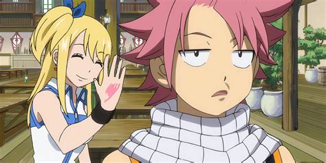 Lucy golpeando a Natsu en señal de frustración