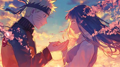 Naruto y Hinata compartiendo un pastel de cumpleaños.