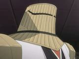 Sajin Komamura con su casco y brazaletes