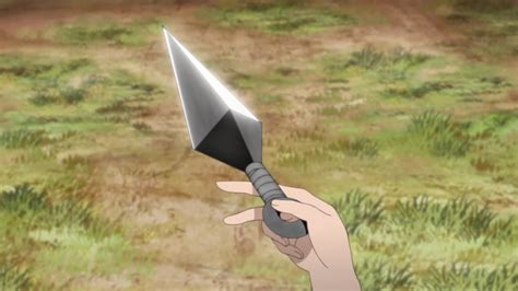 Secuestrador con un kunai apuntando a Sakura