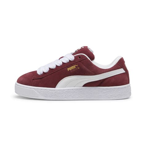 Primer plano de las zapatillas Puma Suede con detalles de One Piece