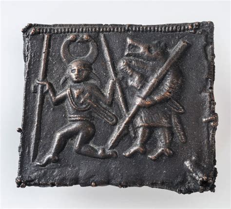 Placa del yelmo de Torslunda: Odín y un guerrero lobo