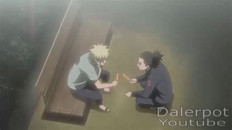 Iruka consolando a Naruto tras la muerte de Jiraiya