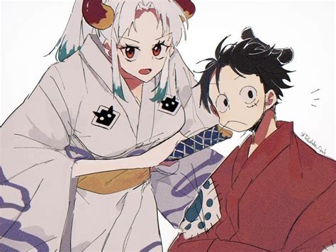 Ilustración de Luffy y Yamato preparándose para la batalla en Onigashima