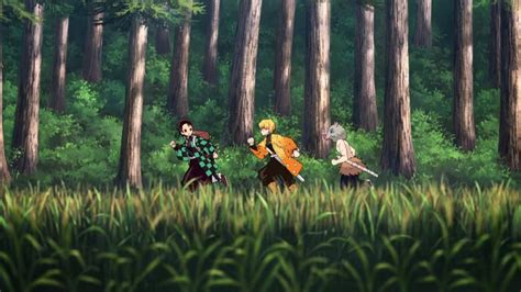 Tanjiro y Zenitsu caminando juntos por un sendero montañoso