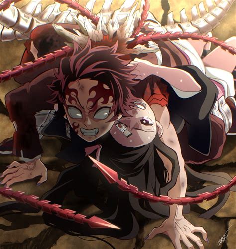 Tanjiro luchando contra un demonio con Nezuko a su lado