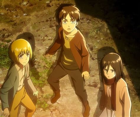 Eren, Mikasa y Armin mirando el océano