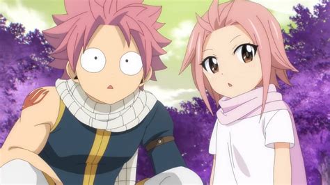 Natsu y Lucy celebrando la victoria