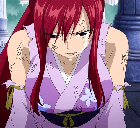 Erza Scarlet enfrentándose a Lucy y Happy