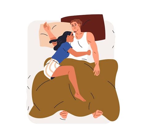 Pareja acurrucada en la cama