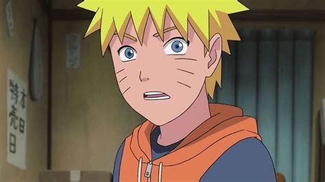 Naruto Uzumaki mostrando las marcas de bigotes y ojos rojos en su transformación inicial
