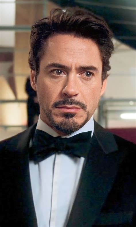 Ilustración de Tony Stark con una expresión sombría y Peter Parker a su lado.