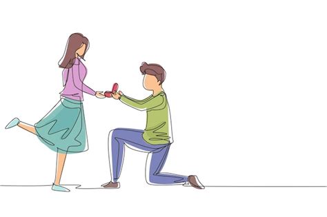 Alessandro arrodillado ofreciendo un anillo a Alessia