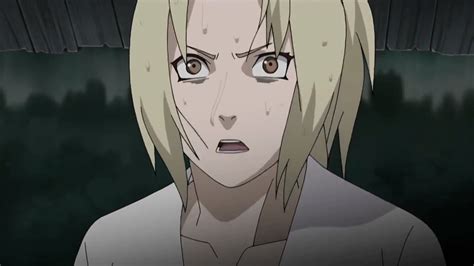 Tsunade de pie frente a la tumba de Nawaki