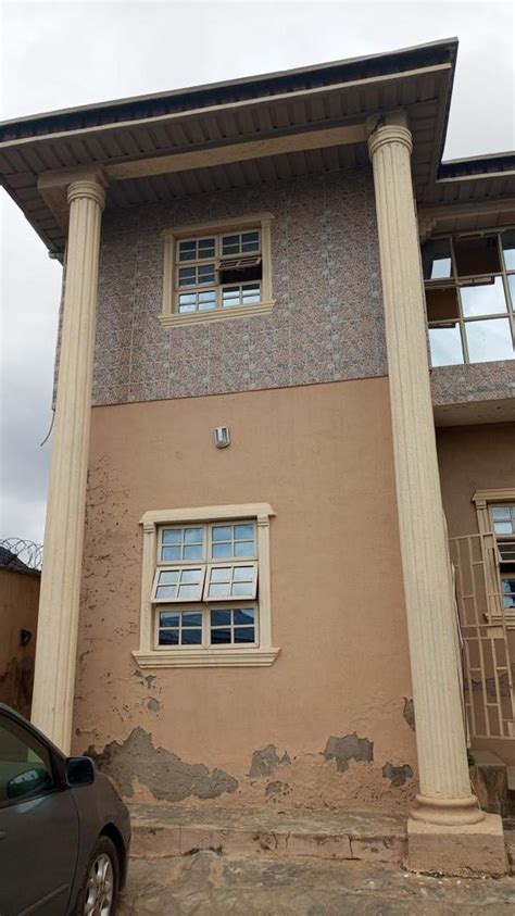 J. K. Coker’s Estate House en Ifako (c. 1914) en 1964