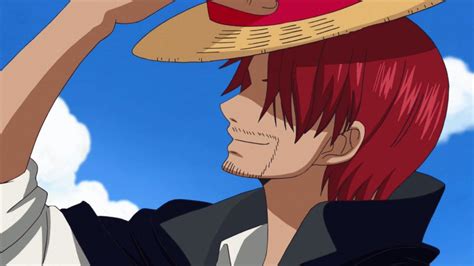 Luffy y Shanks con el sombrero de paja