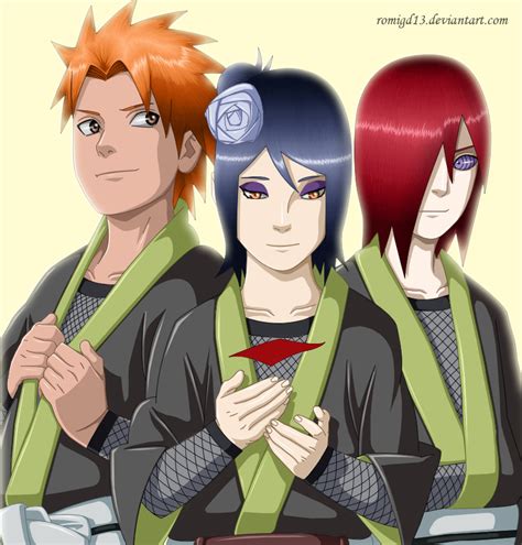 Konan cubriendo los cuerpos de Nagato y Yahiko con flores de papel