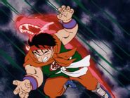 Jackie Chun esquiva el Golpe Colmillo de Lobo de Yamcha