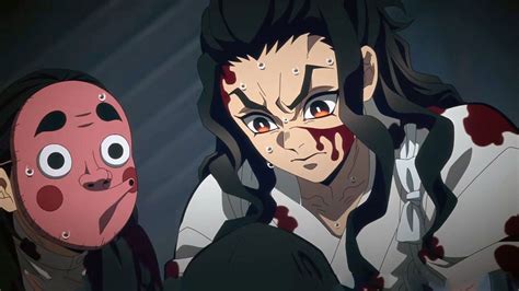 Tanjiro explicando el daño de su espada a un herrero