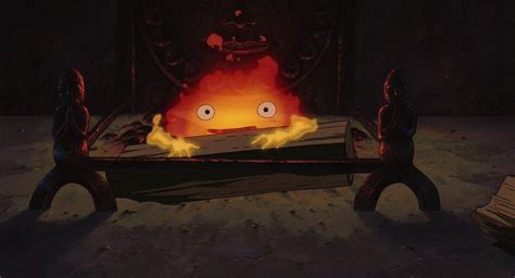 Sophie transformada en anciana interactuando con Calcifer en el Castillo Ambulante